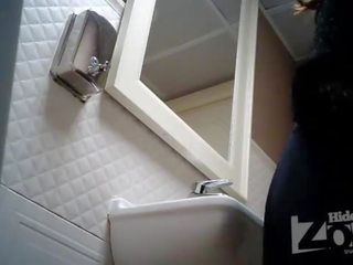 Hidden camera in the toilet of a bar.