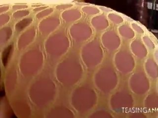 Delicious beauty in a terrific outfit knows how to handle a donger