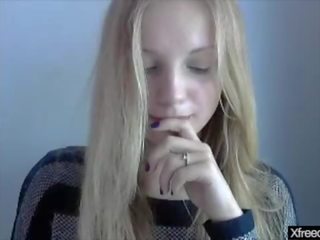 Shy young lady on webcam