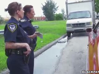 Female cops pull over black suspect and suck his pecker