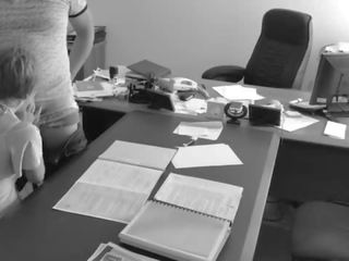 The boss fucks his tiny secretary on the office table and films it on hidden camera