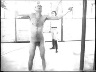 Slave whipped by riding lady (black&white retro video)