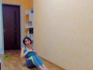 Alluring buhok na kulay kape myla anghel performs gymnastics sa sportwear may suso out&excl;