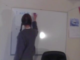 Beautiful School young woman Masturbates In Class On The Teachers Desk